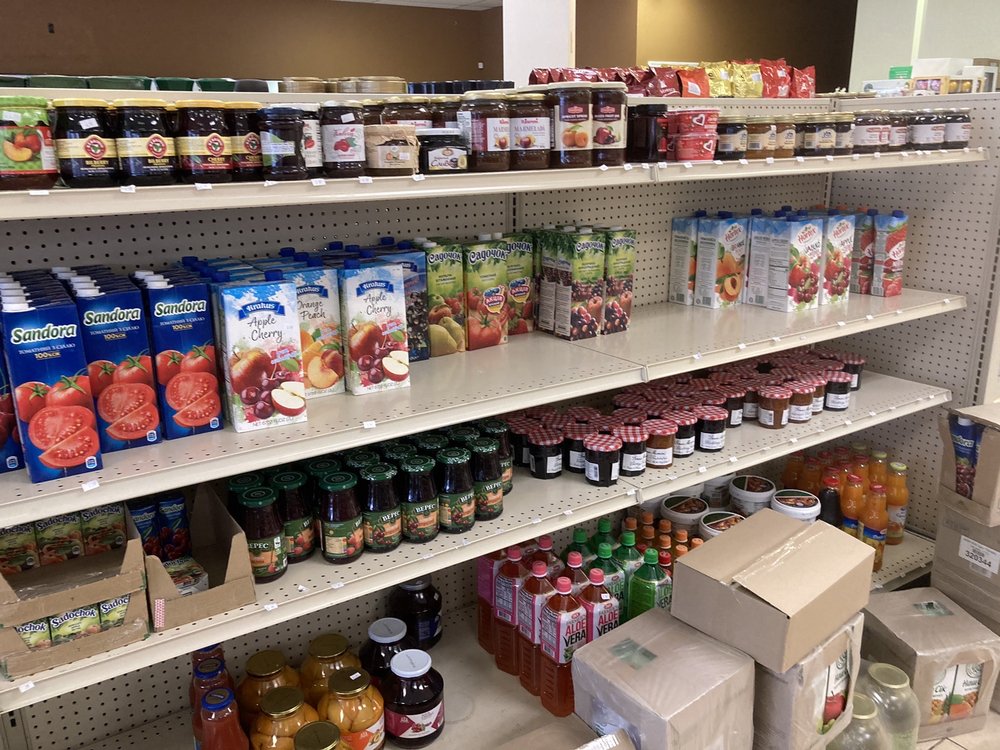 Shelves of familiar juices and preserves